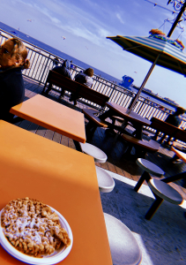Santa-Cruz-boardwalk-funnel-cake-beach-view